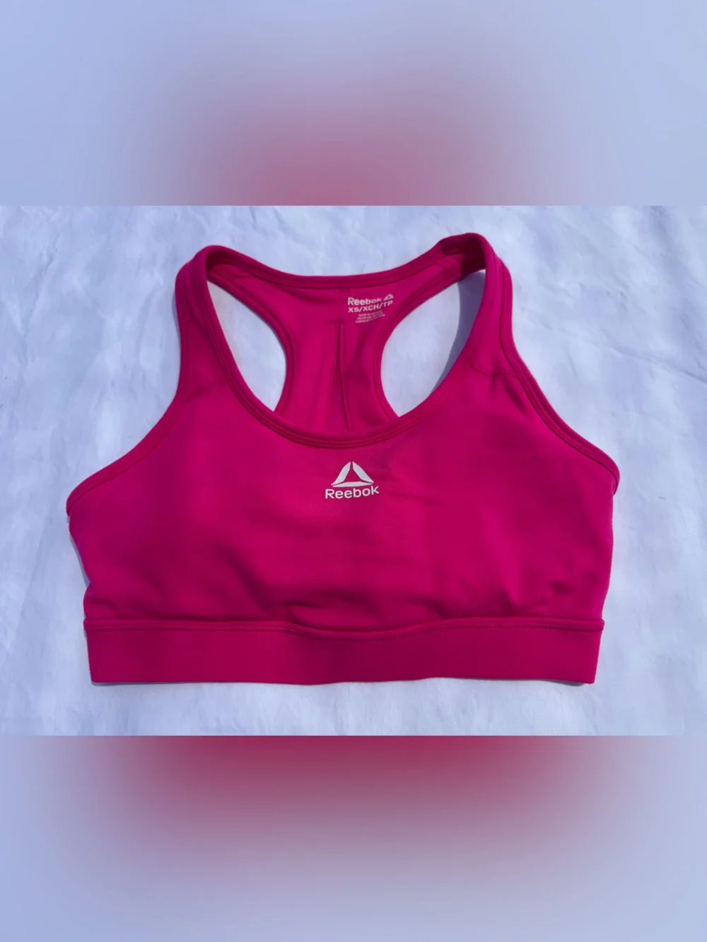 Reebok Women's Bright Fuchsia Racerback Sports Bra